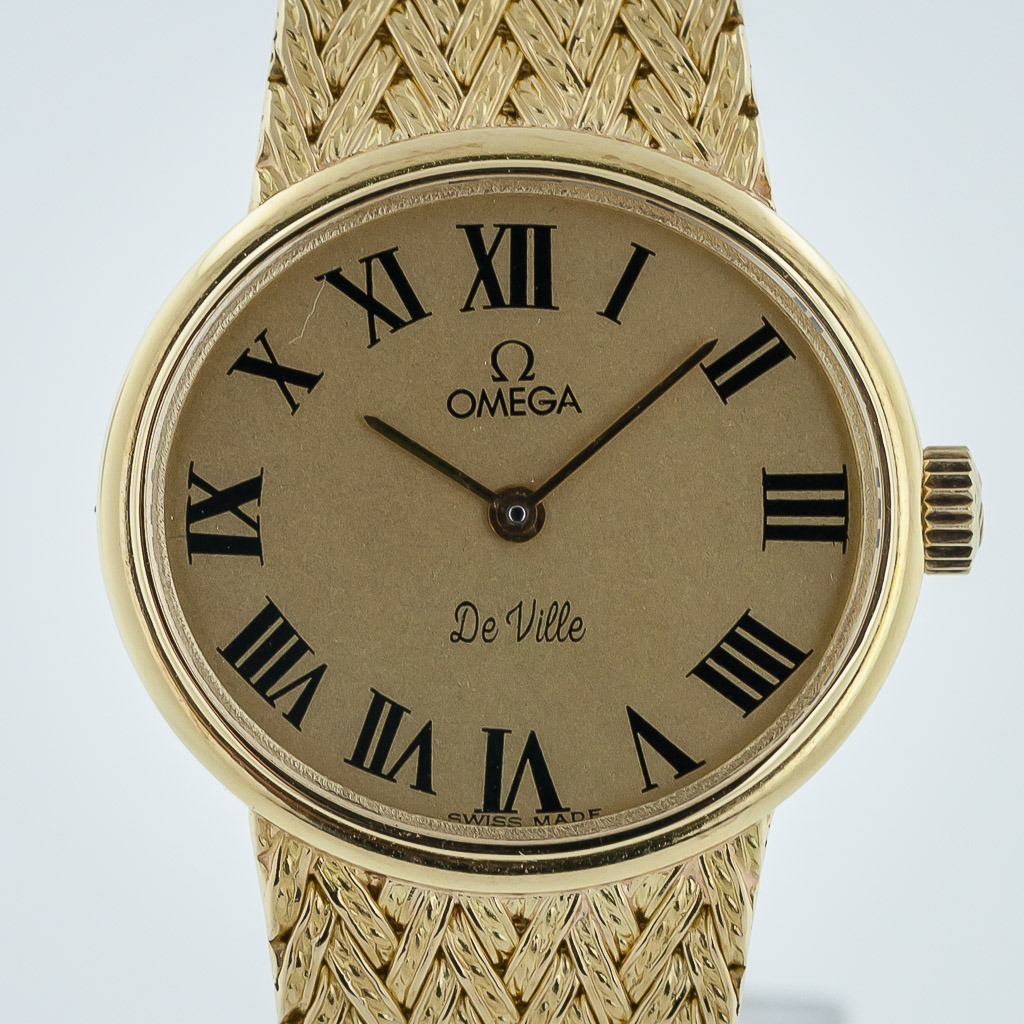 omega 24k gold watch